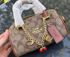 Coach Charm
