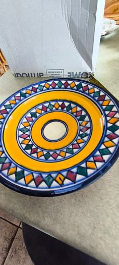 3 hanging wall plates -1- from Malta hand painted -2- from PORTGAL HAND PAINTED-3- FROM MAROCO - EACH IS 22.00 Euro.