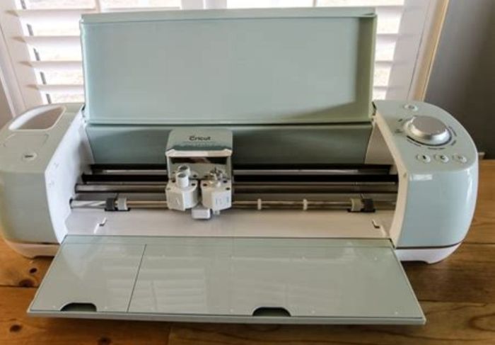 Cricut machine explore air 2 with 3 large rolls of vinyl, mats