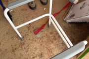 Adjustable toilet safety frame / surround rail in good used condition.