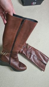 Marco Moreo size 40.5 knee high boots. Beautiful brown leather with gold chain detail. Wedge heel. Stunning g boots and very comfortable.