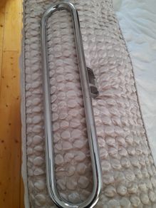 Wall mounted towel rack