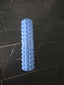 Foam roller with spikes