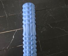 Foam roller with spikes