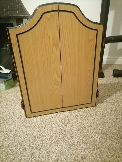 Dartboard with darts