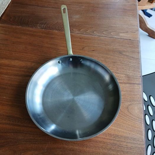 Skillet. Vintage brass, copper and stainless steel skillet.