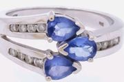 Stunning Tanzanite and Diameter crossover ring 14k