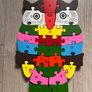 wooden jigsaw puzzle with numbers and letters Image 2