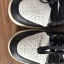 Nike Air Jordan 1 Mid trainers in the classic black, white and red colourway Image 7