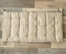 H&M home tasseled cushion 120 x 60 cm