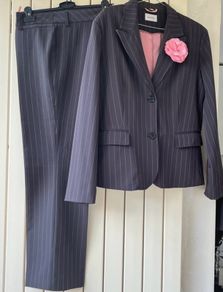 Two ladies pinstripe suits