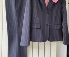 Two ladies pinstripe suits