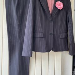 Two ladies pinstripe suits