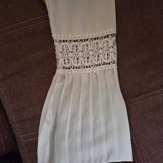 White crochet and pleated beach cover-up dress with a brown belt. Size 10