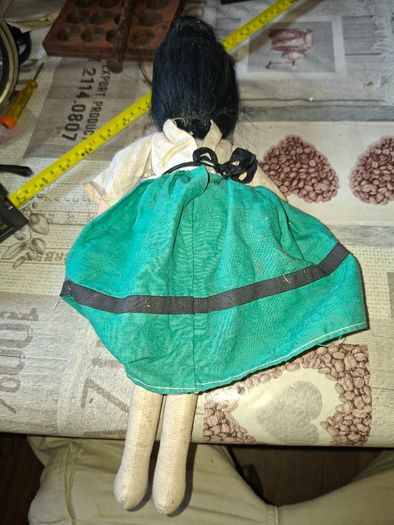 Vintage 1940s Papier Mache Doll, featuring a painted face on a soft fabric body,