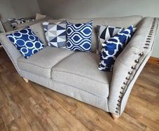 Cream couch and chair