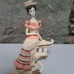 Vintage Lady on the Stairs figurine