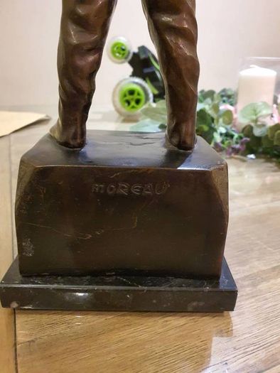 Fisher boy, bronze statue