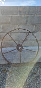 old wrought iron wheel.