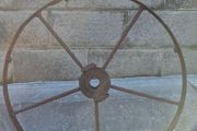 old wrought iron wheel.