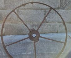 old wrought iron wheel.