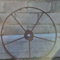 old wrought iron wheel.