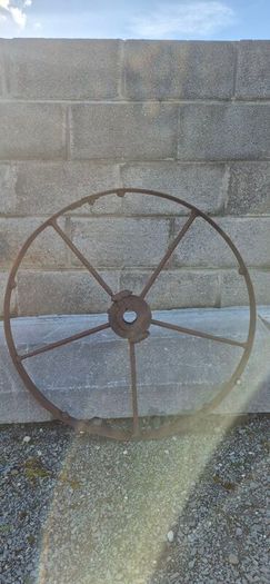 old wrought iron wheel.