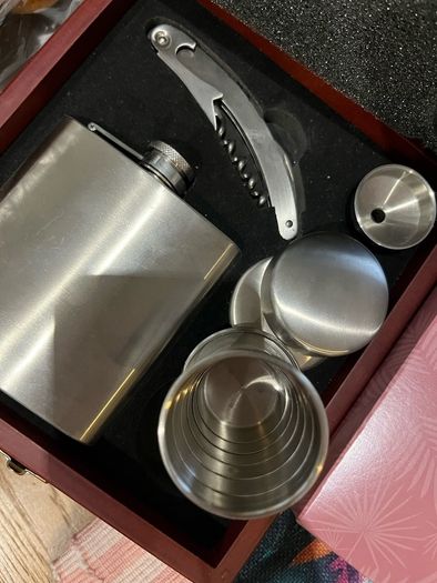 Drinks flask cups and cork screw