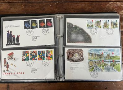 Collection of  74 UK First Day Cover stamps 1987 to 1992 in album plus 5 extra pages and book