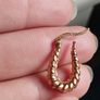 Hoop earrings made of 925 sterling silver with gold plating. Image 3