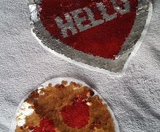 Reversible sequined sew on patches