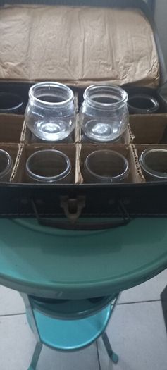 vintage set of 12 jars in lovely leather carry case