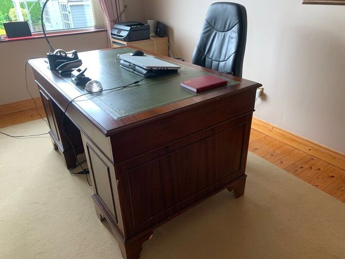 8 drawer Mahogany office desk & orthopaedic chair
