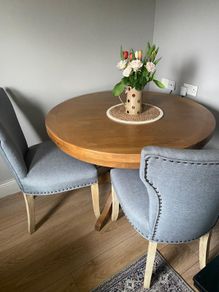 solid wood dining table with four chairs