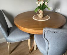 solid wood dining table with four chairs