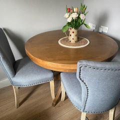 solid wood dining table with four chairs
