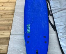 surfboard, bag and leash