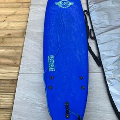 surfboard, bag and leash