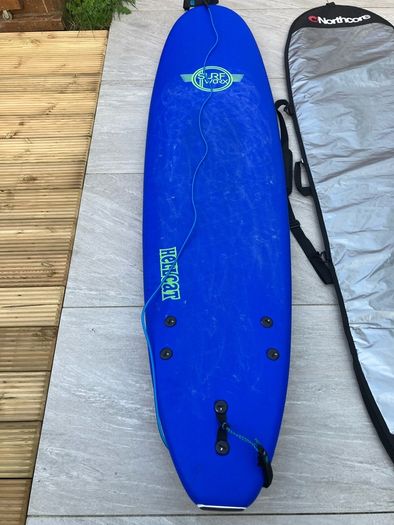 surfboard, bag and leash