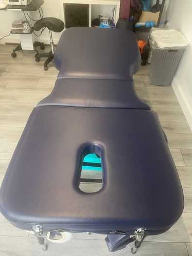 Massage table