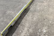 Galvanised lighting pole and T-bar.