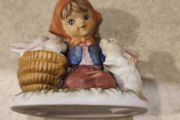 Lovley Figurine Of Young Girl With Rabbet.