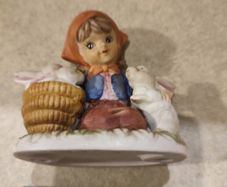 Lovley Figurine Of Young Girl With Rabbet.