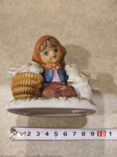 Lovley Figurine Of Young Girl With Rabbet.