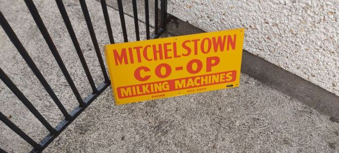 Mitchelstown hay barn advertising,sign by currans of Clonmel,,original ,came out of the offices in mitchelstown branch ,,,few marks  ,lovely advertising display item, for any garage ,man cave or personal collection, sold as is