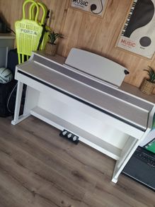 White Thomann piano