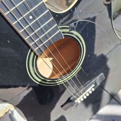 Axman electro acustic guitar