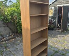 Tall oak-effect bookcase