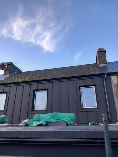 Standing seam roof, sale and delivery of roofing materials and gutter systems