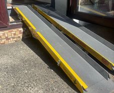 Portable wheelchair ramp